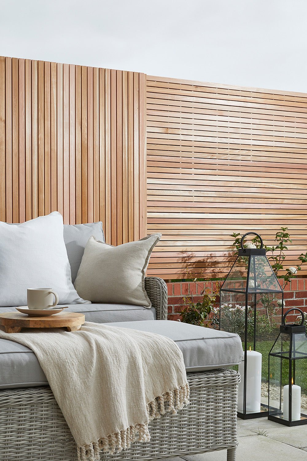 Cedar Slatted panels used as fence panelling