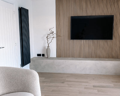 Minimalist, neutral living room with a SlatWall Natural Oak media wall