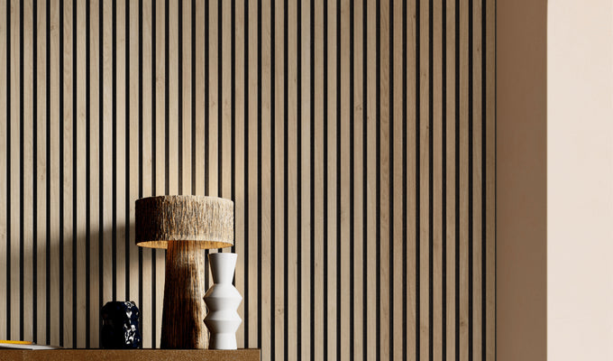 Image of a Natural Oak on Black SlatWall background with a desk table and lamp