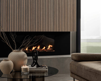 SlatWall Washed Oak panels on a feature wall above a fireplace