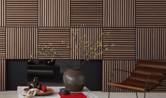 A Japandi-style living room featuring SlatWall Mini Walnut panels in alternating directions on a media wall with a fireplace.