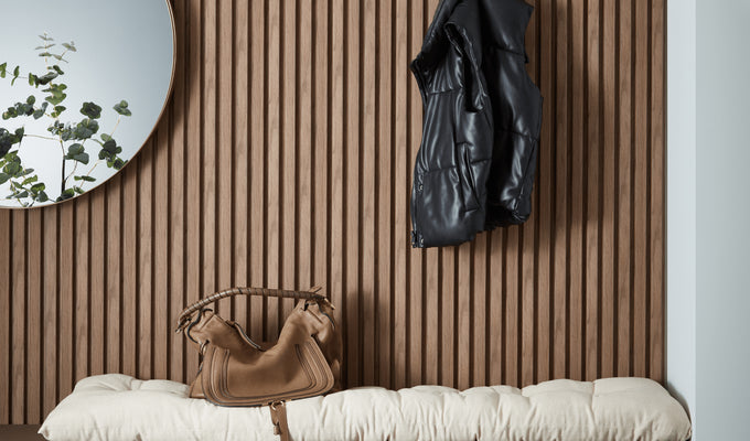 Waterproof walnut panels on bench and wall behind