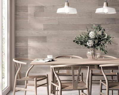 Light coloured wooden table and chairs with Peel & Stick Sky Grey covering the wall behind.