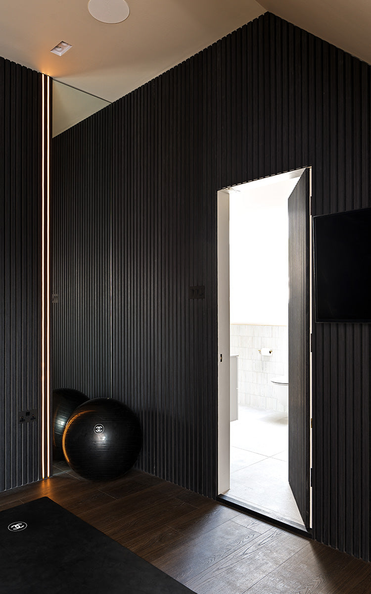 mobile image for blog showcasing how to create a hidden door with wall panels 