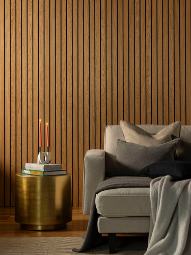 photo to show example of an oiled acoustic panel with a sofa in front of it 