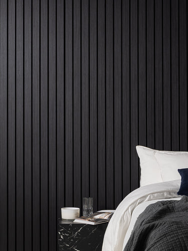 photo of a black acoustic panelling a bedroom 
