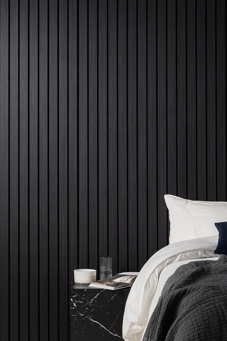 photo of a black acoustic panelling a bedroom 