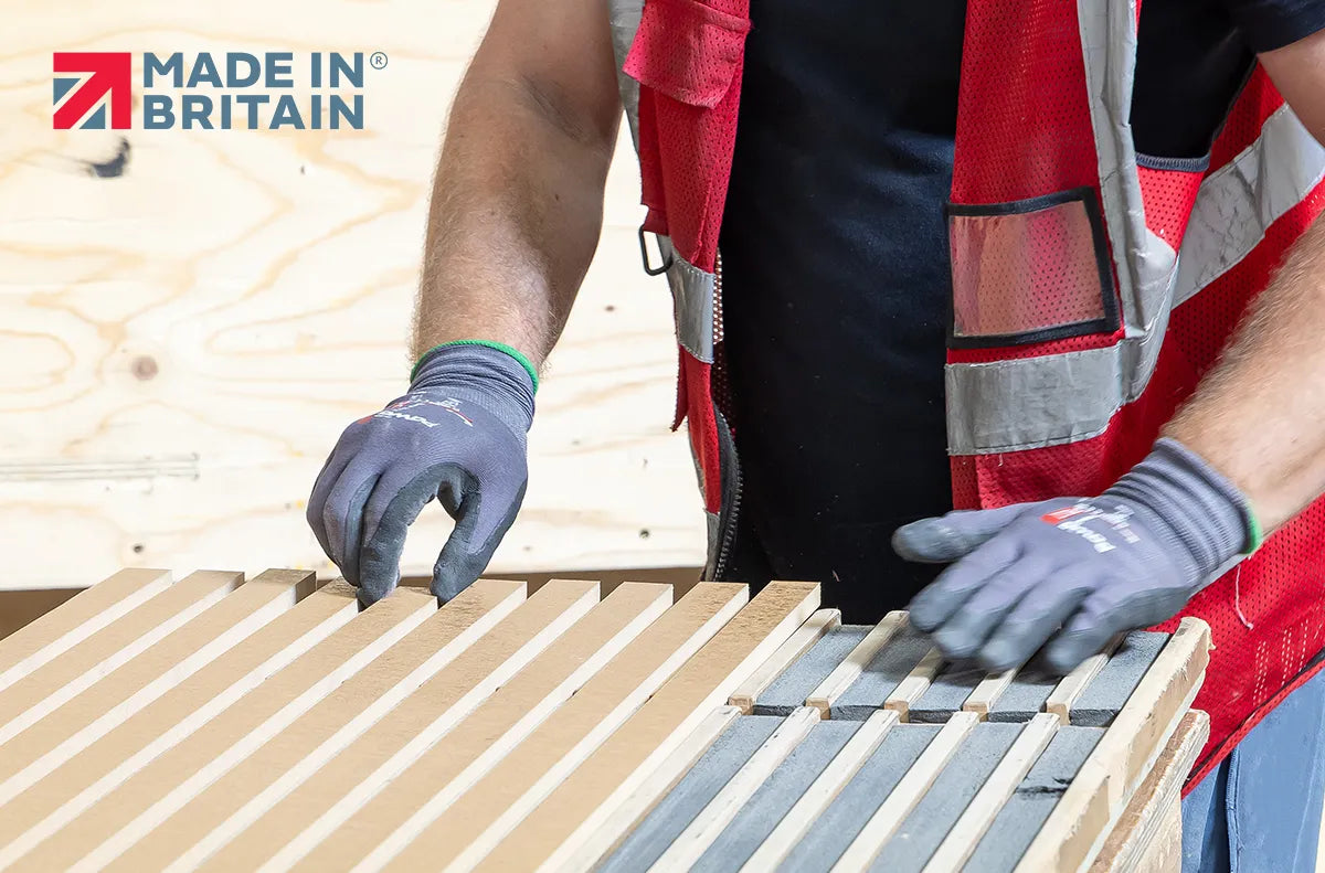 image of a person in factory making acoustic panels 