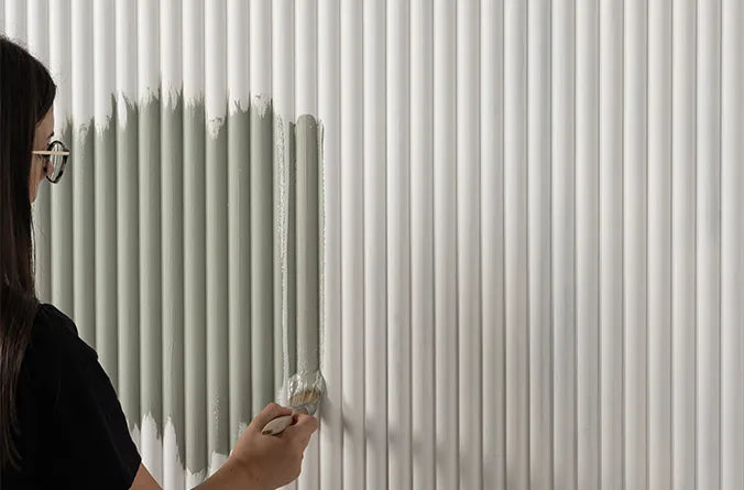 image of person painting mdf panelling 