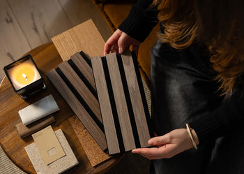 image of person holding slatwall sample