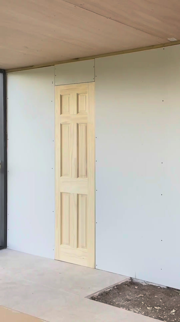 video of jack kinsey creating a hidden door with slatwall panels 