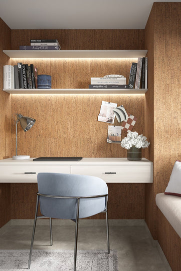 CorkWall Evora Natural on the wall in a home office. White shelves on the wall with design related books.