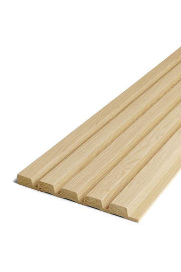 Close up showing tongue end cap fitting to natural oak panel