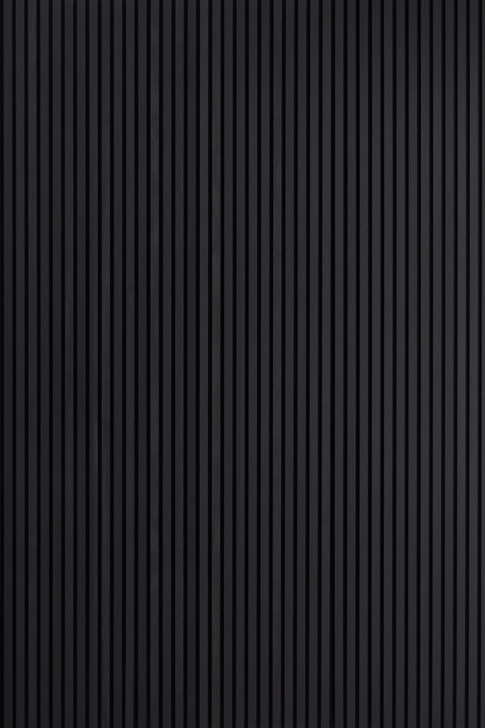 A display of three Charcoal Black Acoustic SlatWall Panels from Naturewall. 


