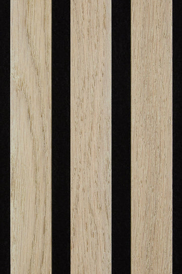 Close up of three washed oak veneered wood slats revealing the texture, on a black felt backing