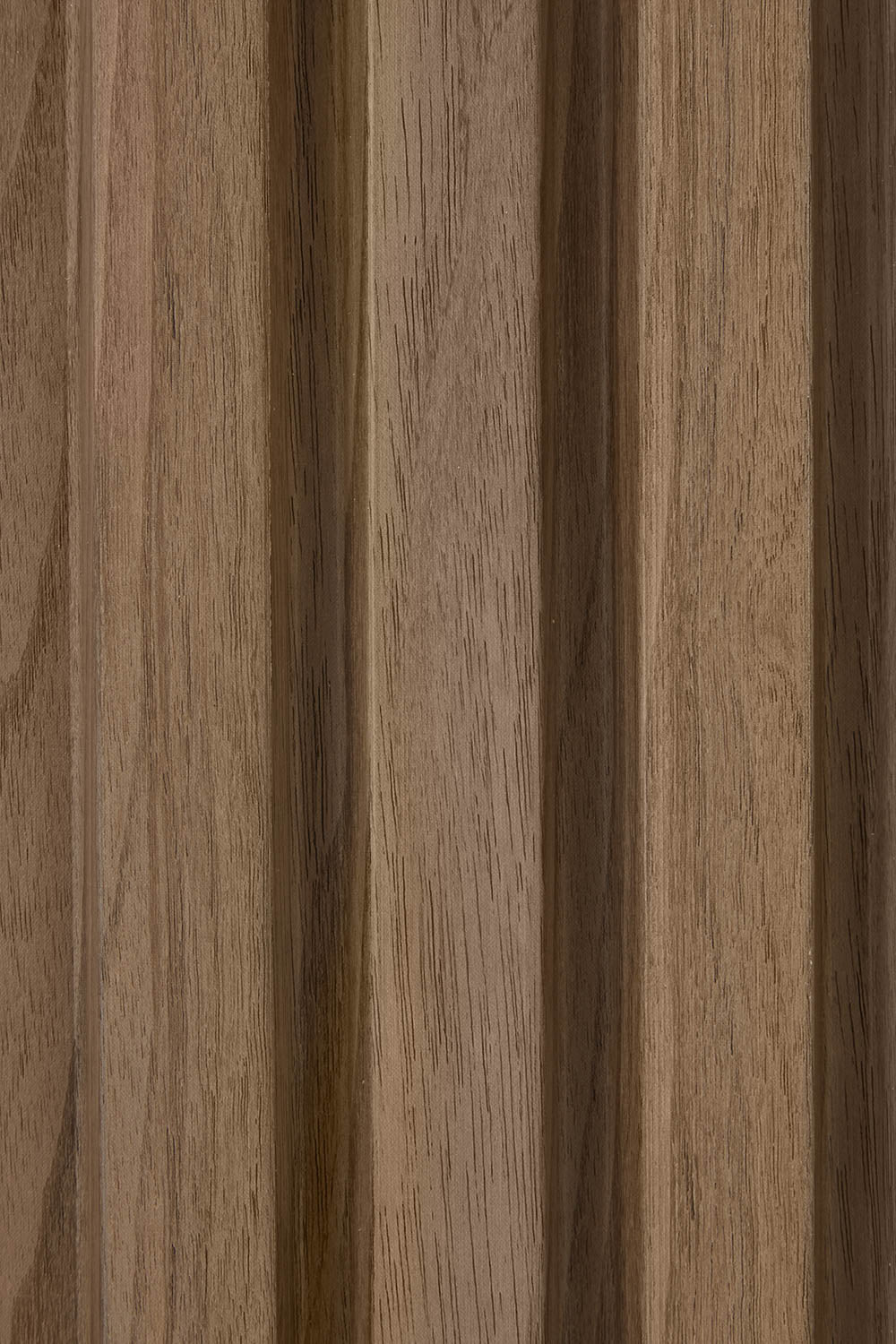 Close up of waterproof slatwall panel in walnut from Naturewall.

